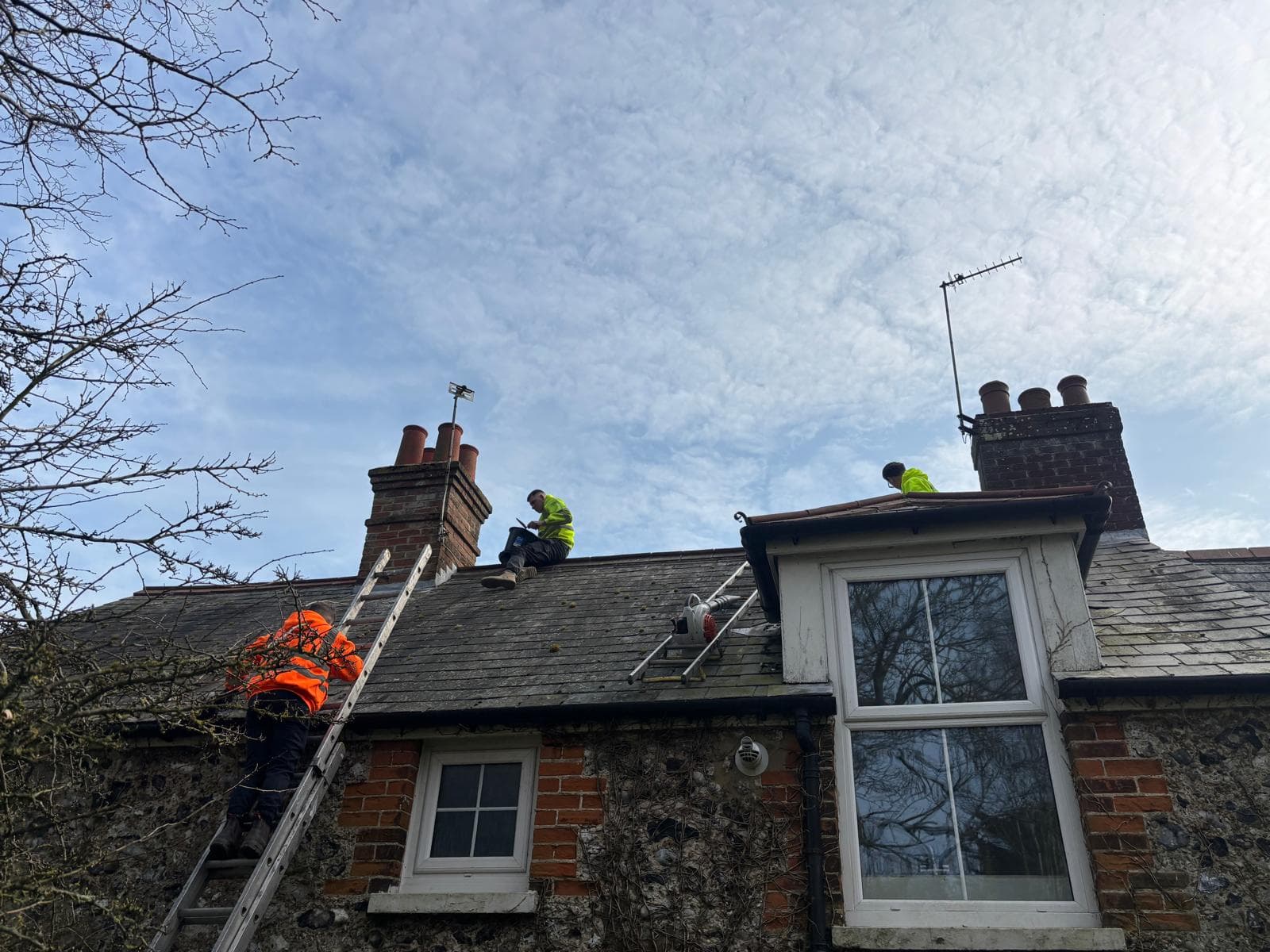 Roofer working on roof Dover
