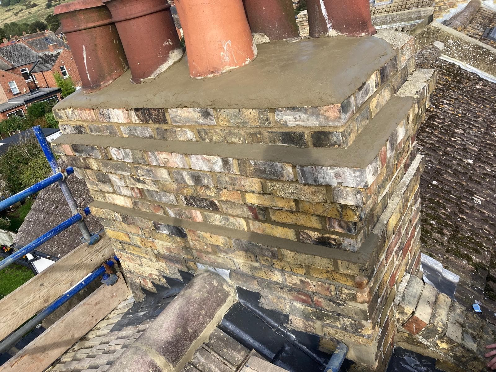 Roofing contractors at work on a property in Canterbury